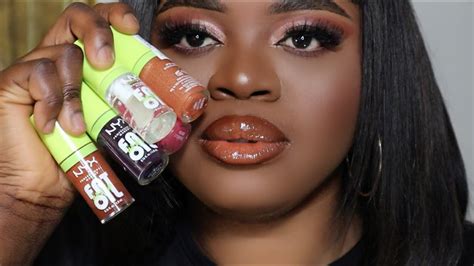 Oiled Up Ebony Babe Eats Cum .